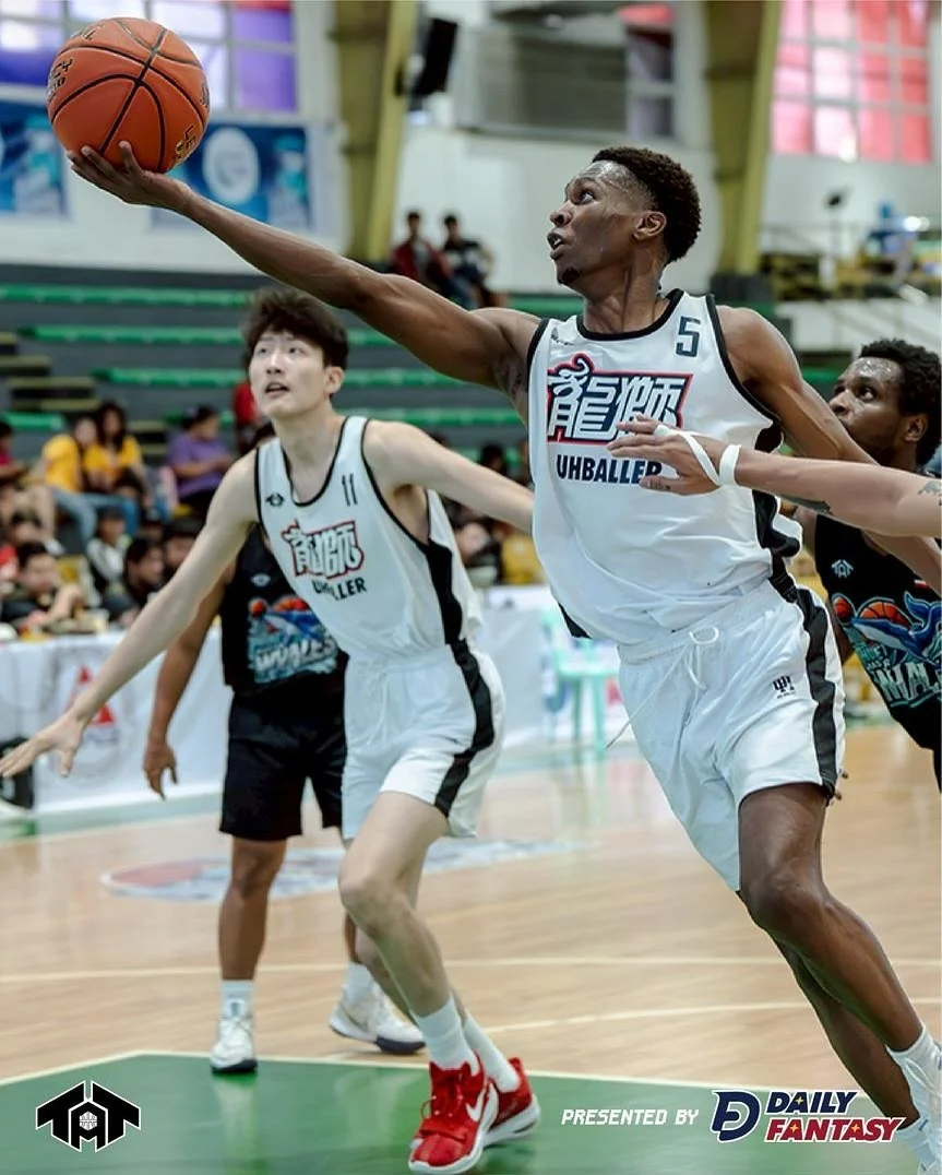Jordan Lewis in basketball game action